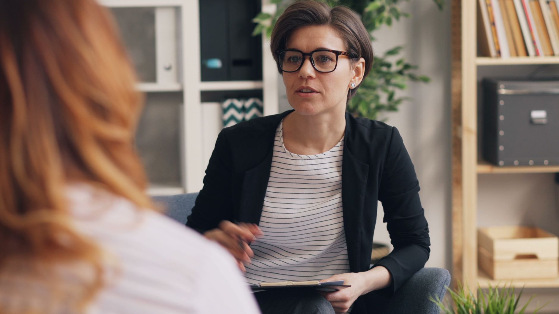Woman consulting with a licensed aesthetic provider about facial volume changes