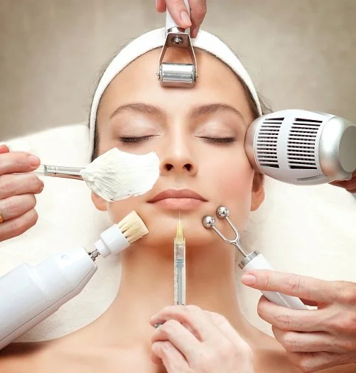 Skin rejuvenation tools around a woman’s face