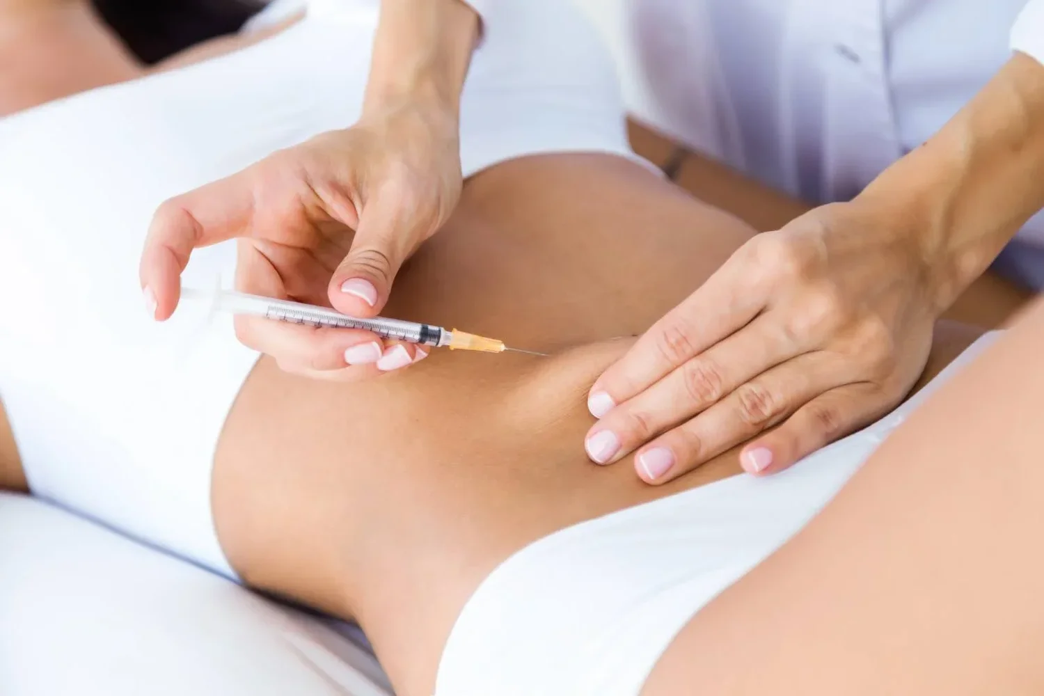 A vitamin injection being administered